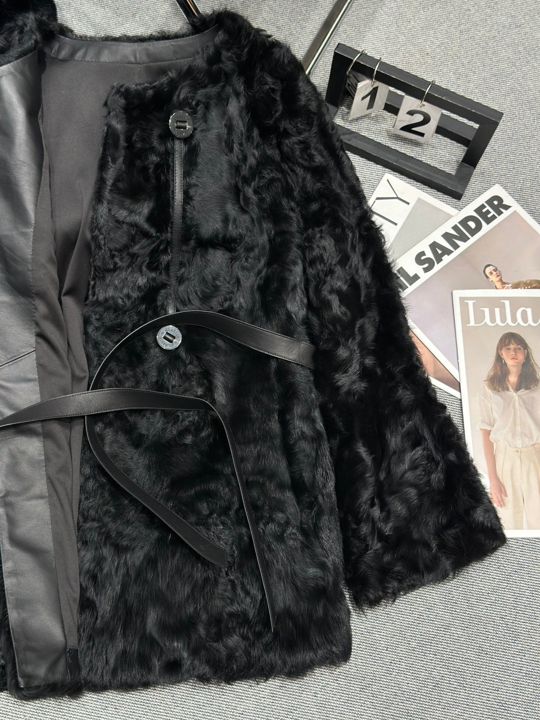 LUXURY BLACK TEXTURED FUR COAT WITH LEATHER BELT DETAIL