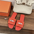 CORAL SUEDE BUCKLE SLIDE SANDALS