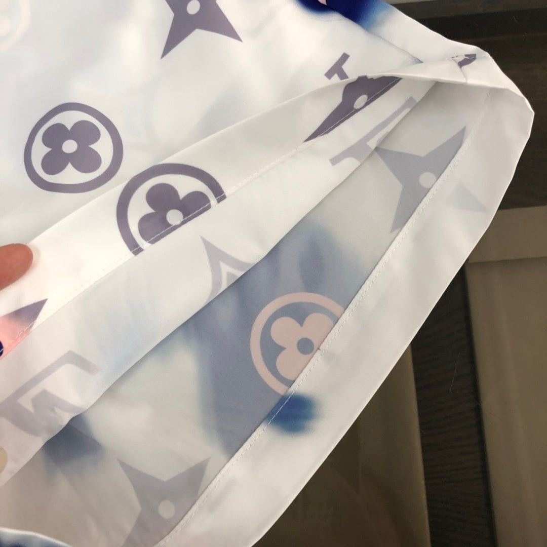 WHITE TIE-DYE PRINT SWIM SHORTS