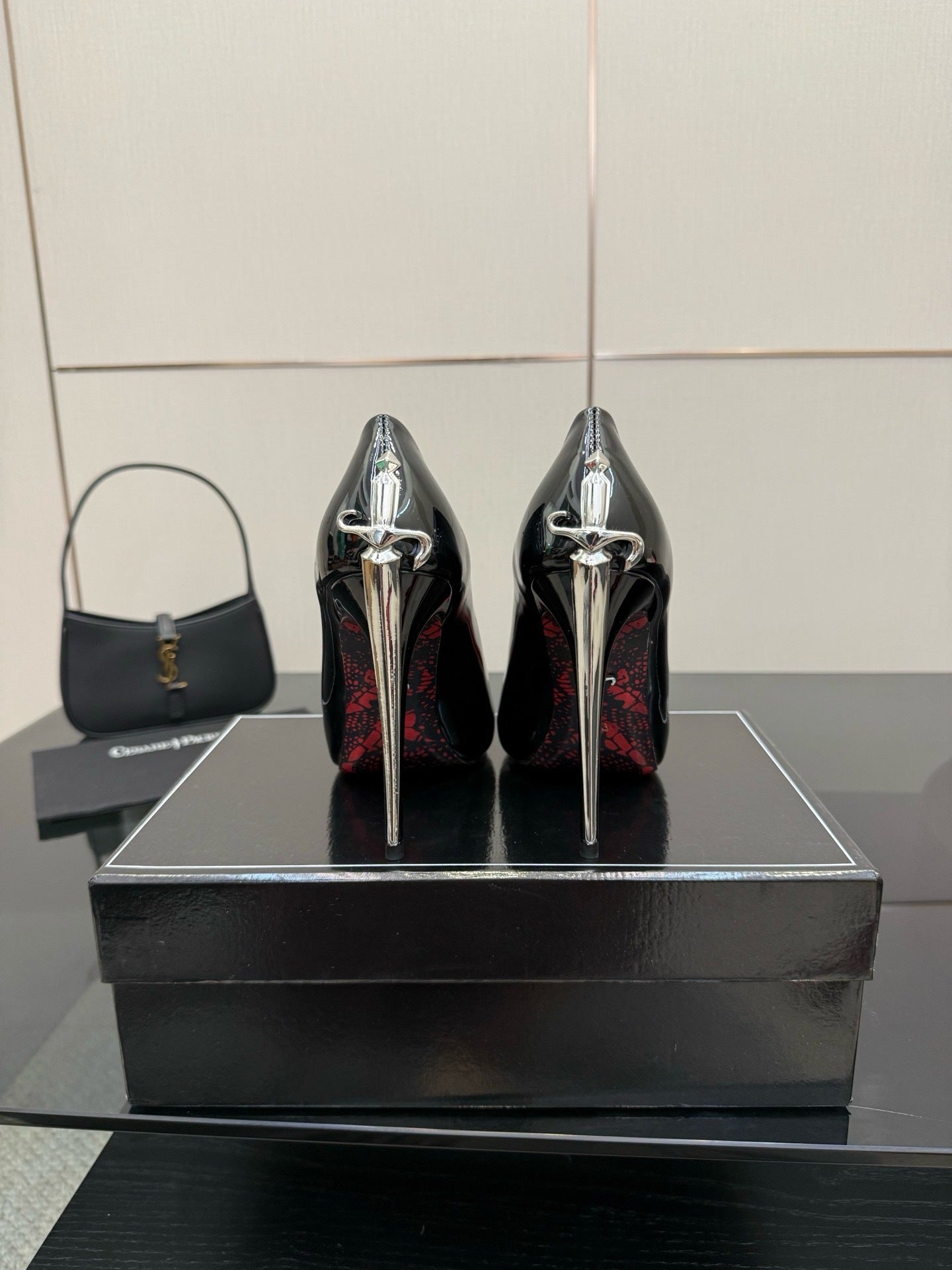 METALLIC DAGGER STILETTO PUMPS – BLACK PATENT EDITION