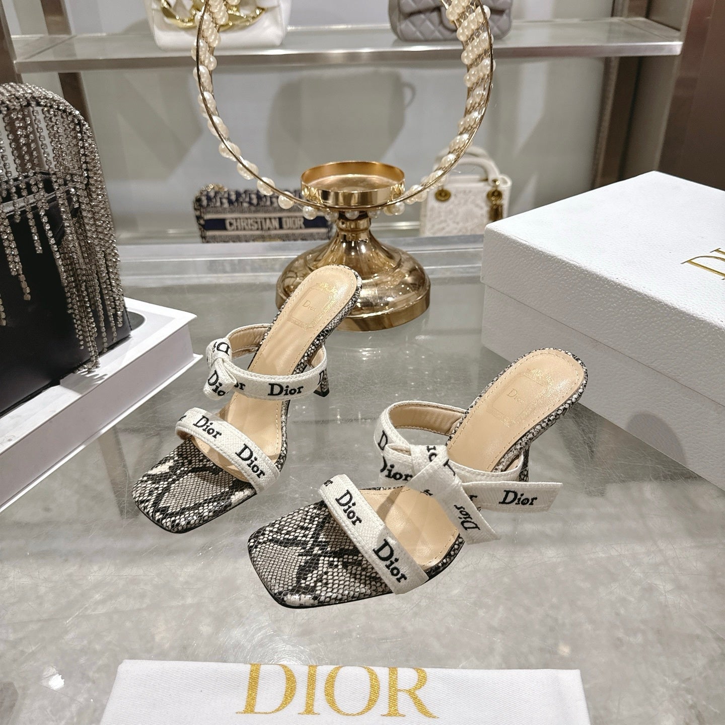 SNAKESKIN PRINT LOGO STRAP BOW HEEL SANDALS