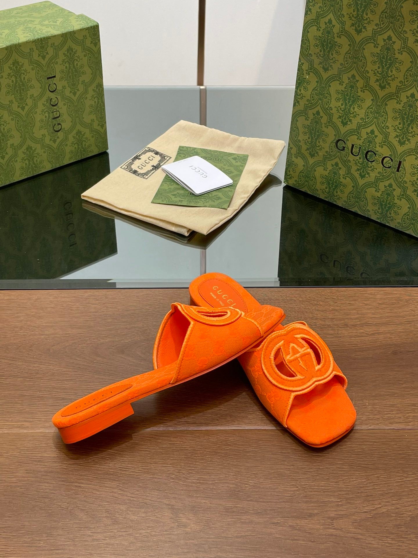 ORANGE EMBOSSED LOGO SLIDES