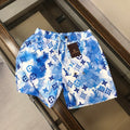 MONOGRAM SWIM SHORTS – BLUE TIE-DYE