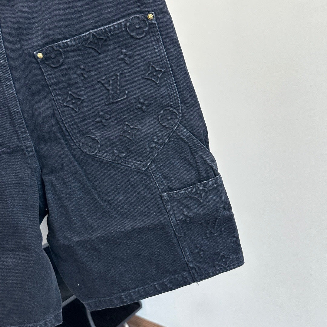 MONOGRAM EMBOSSED DENIM SHORTS