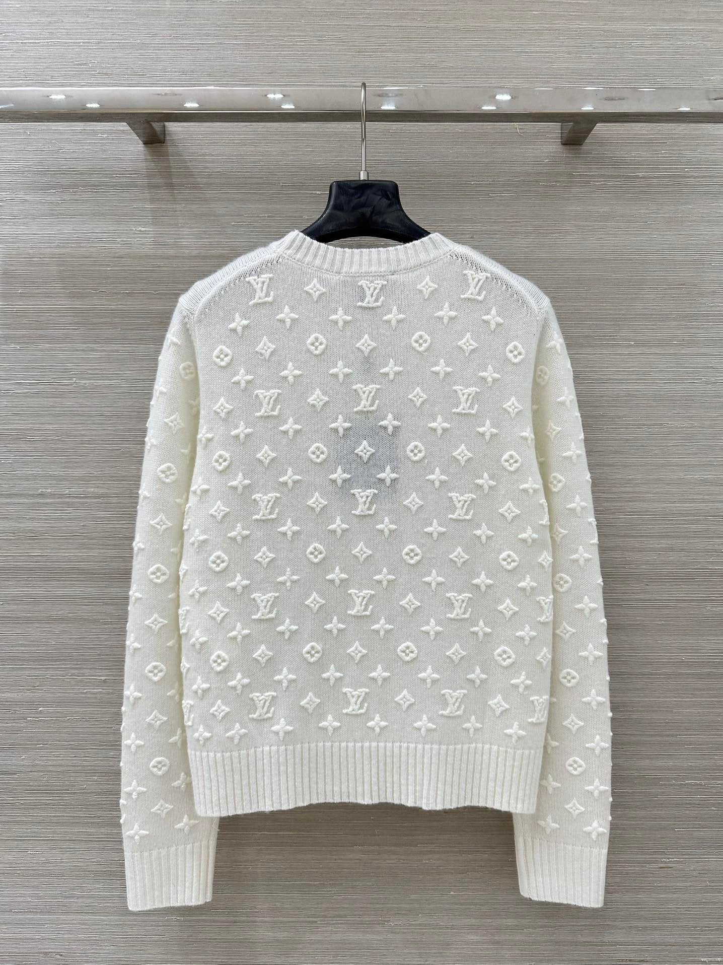 EMBOSSED KNIT SWEATER