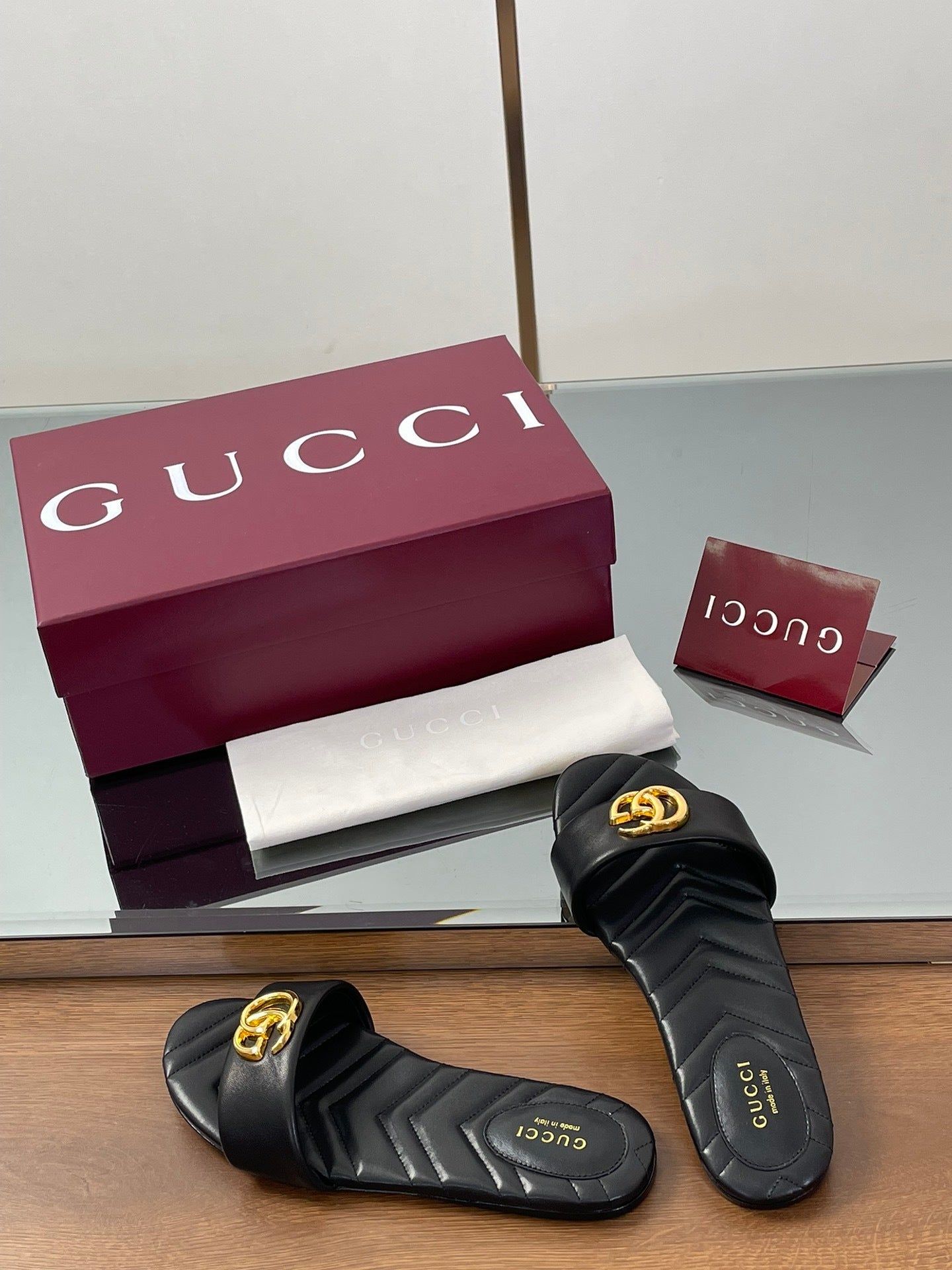 BLACK QUILTED SLIDE SANDALS