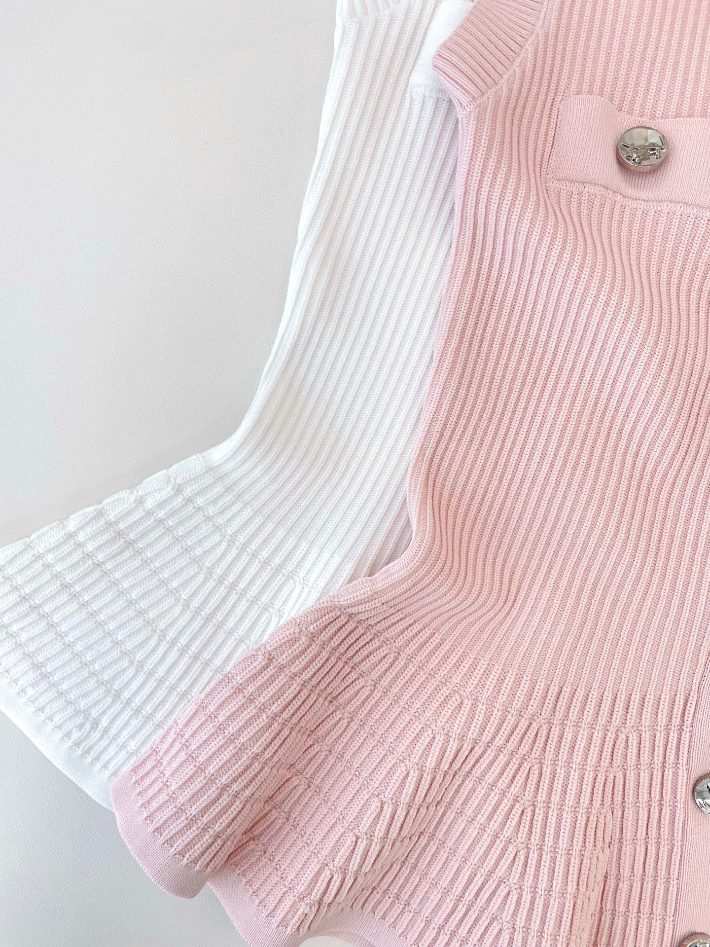RIBBED PEPLUM KNIT TOP – BUTTON DETAIL