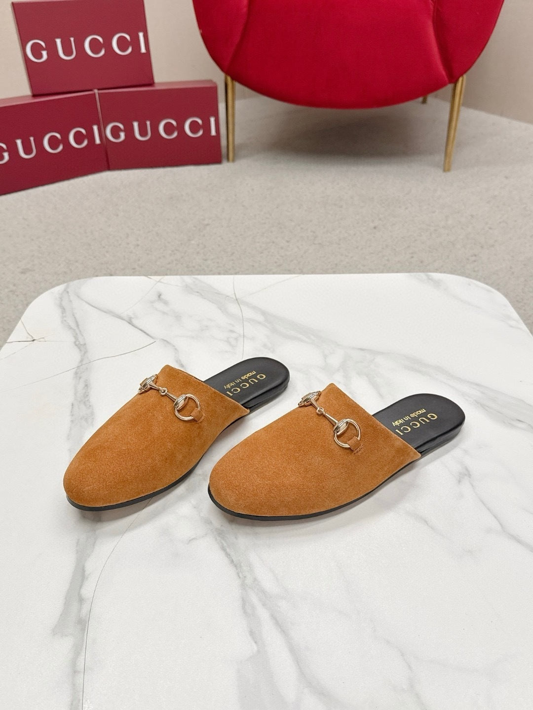 SUEDE SLIP-ON MULES WITH GOLD HORSEBIT DETAIL