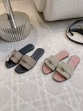 NEUTRAL TONE FLAT SANDALS WITH MODERN METAL HARDWARE