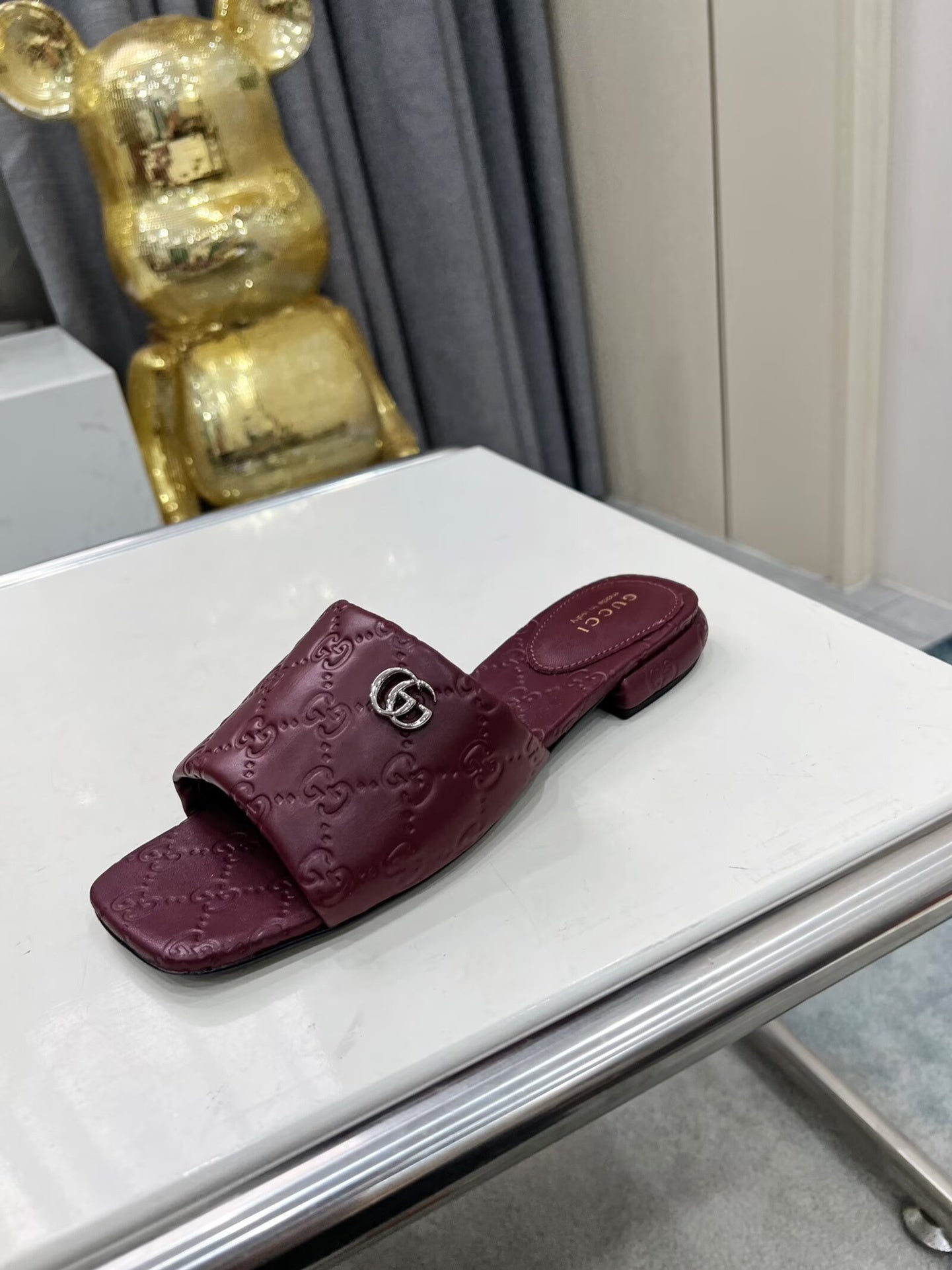 BURGUNDY EMBOSSED LOGO SLIDE SANDALS WITH METAL DETAIL