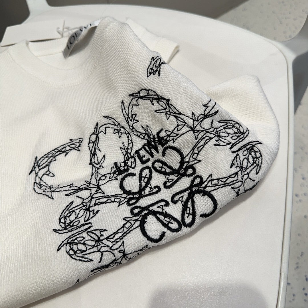 WHITE GRAPHIC PRINT SLEEVELESS TOP