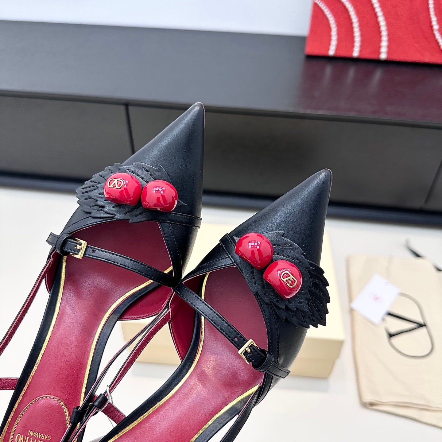 CHERRY EMBELLISHED T-STRAP POINTED HEEL PUMPS – BLACK