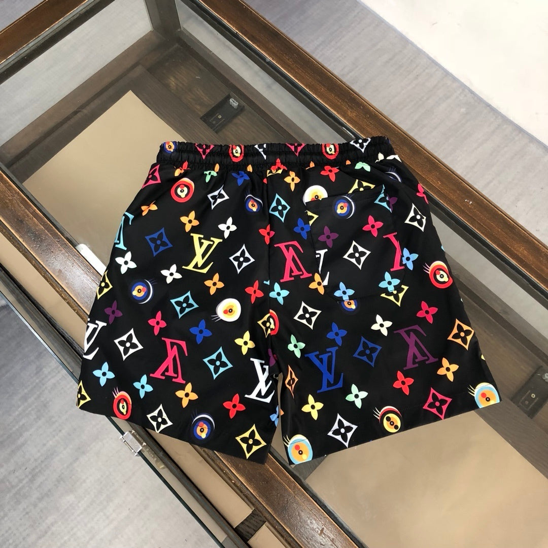 WHITE MULTICOLOR PRINT SWIM SHORTS