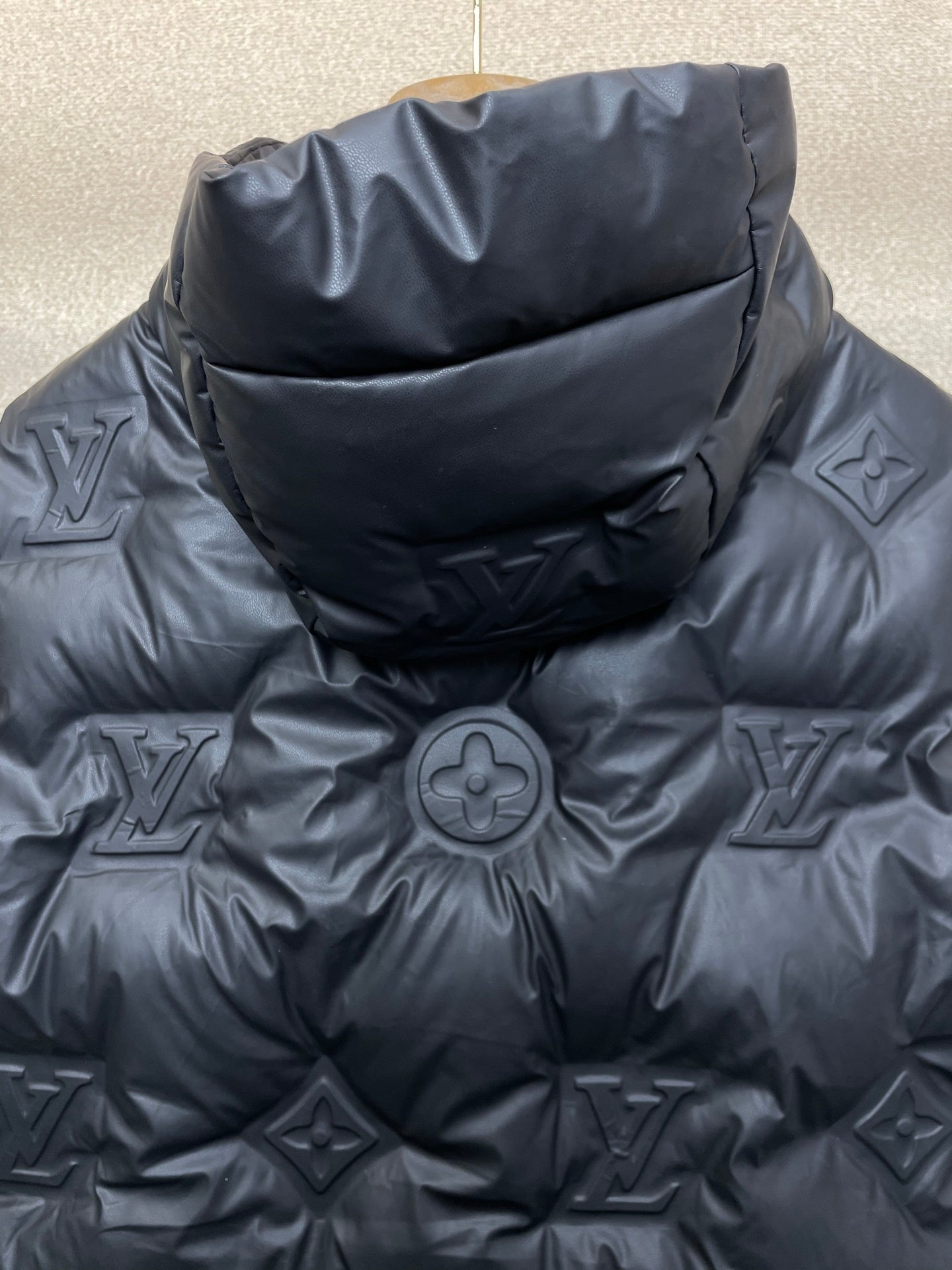 EMBOSSED PADDED HOODED VEST