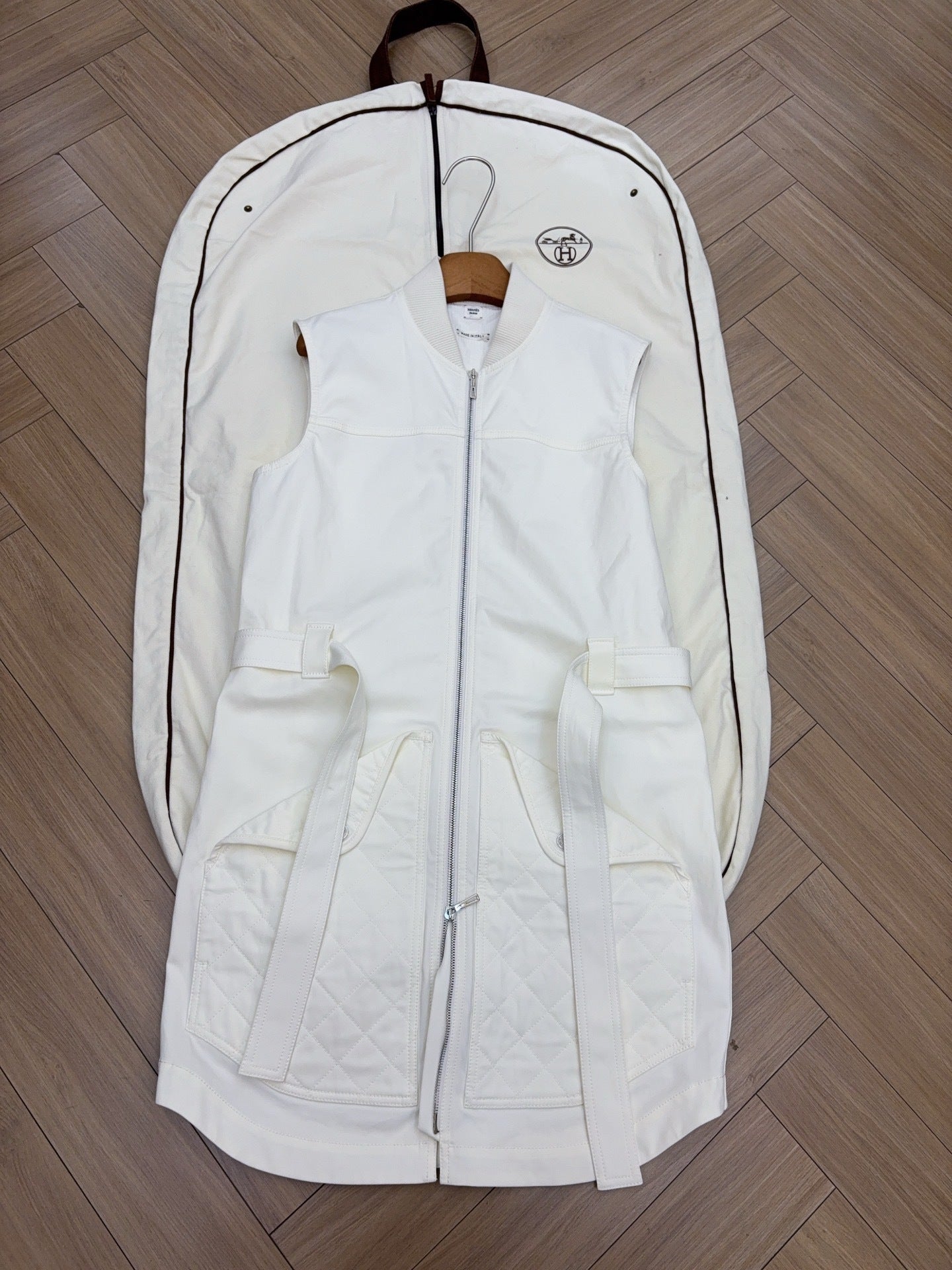 QUILTED ZIP-FRONT SLEEVELESS VEST WITH BELTED DETAIL