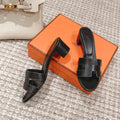 BLACK LEATHER BLOCK HEEL SLIDES