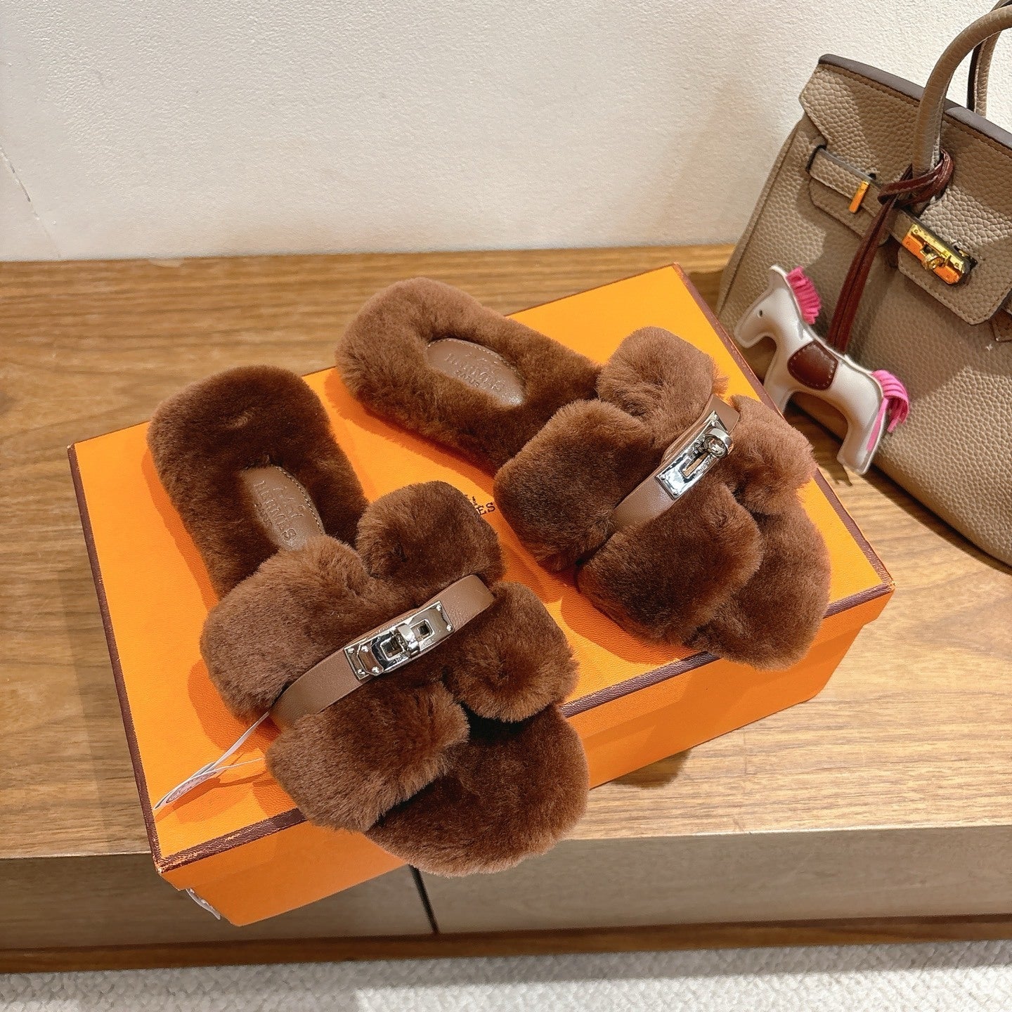 BROWN FAUX FUR MULE SLIPPERS WITH SILVER-TONE ACCENT