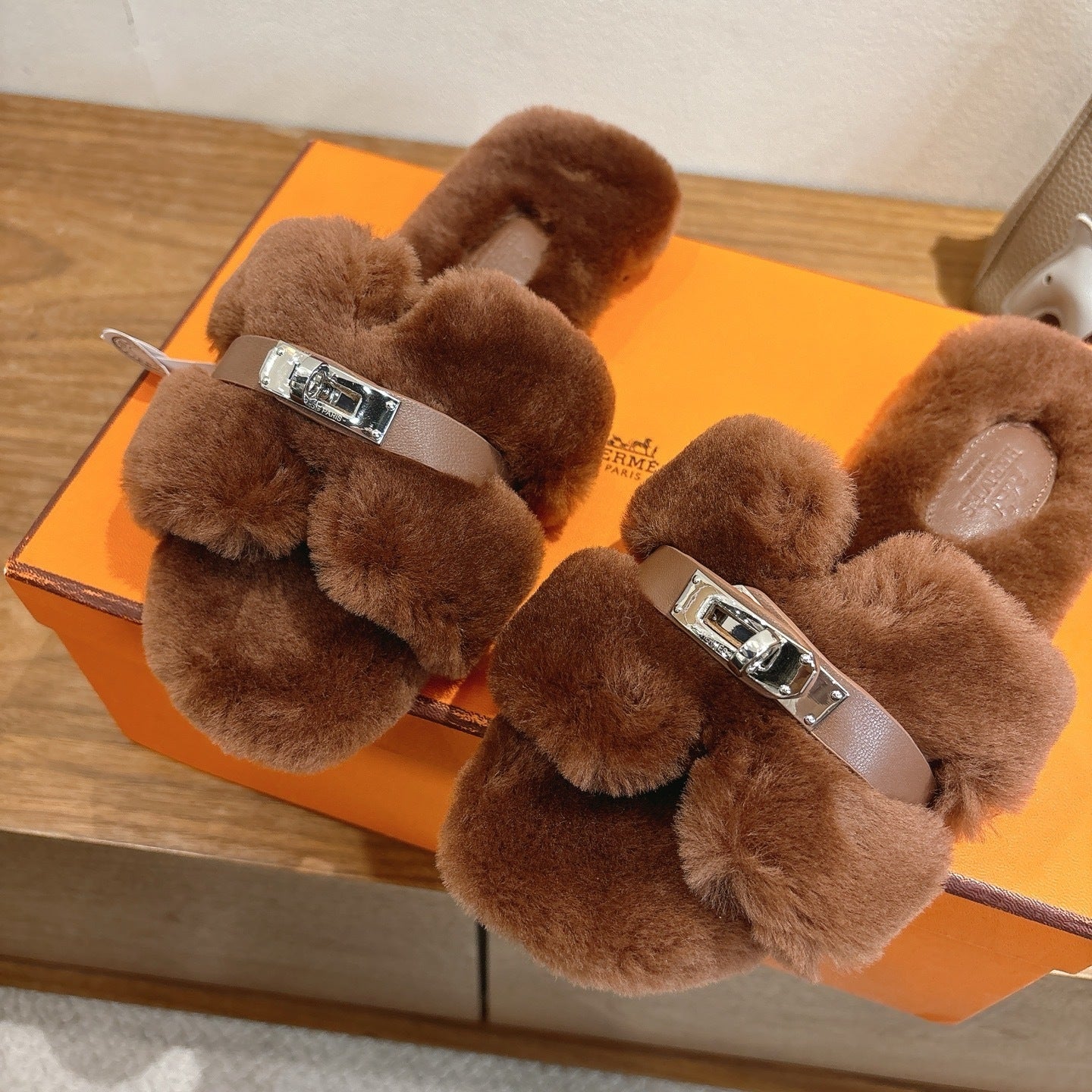 BROWN FAUX FUR MULE SLIPPERS WITH SILVER-TONE ACCENT