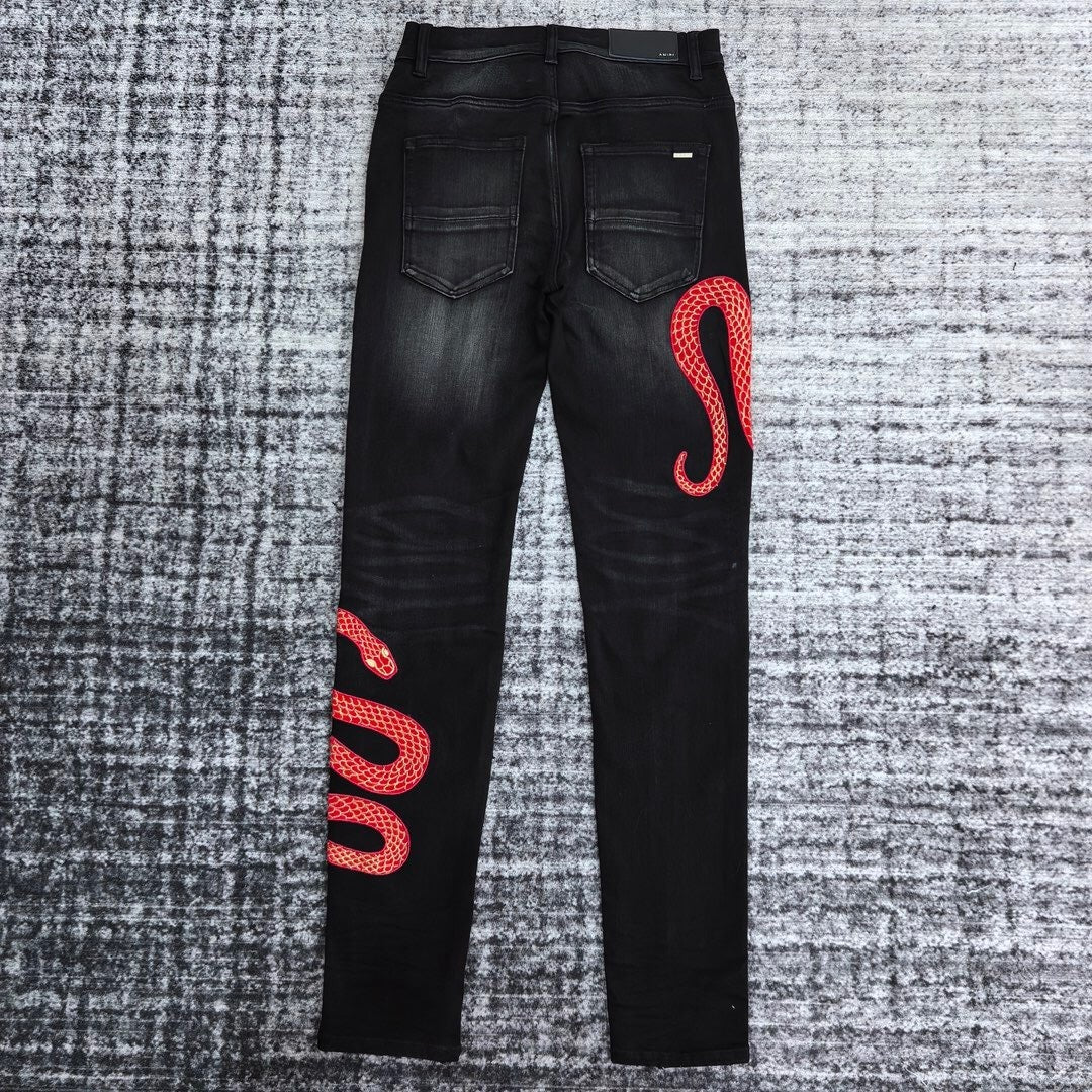 SNAKE GRAPHIC DISTRESSED SKINNY JEANS