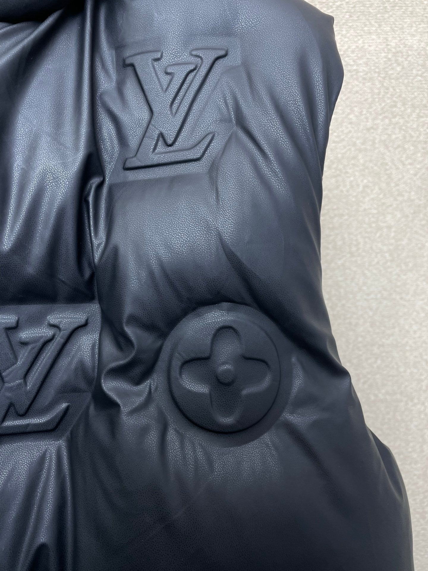 EMBOSSED PADDED HOODED VEST