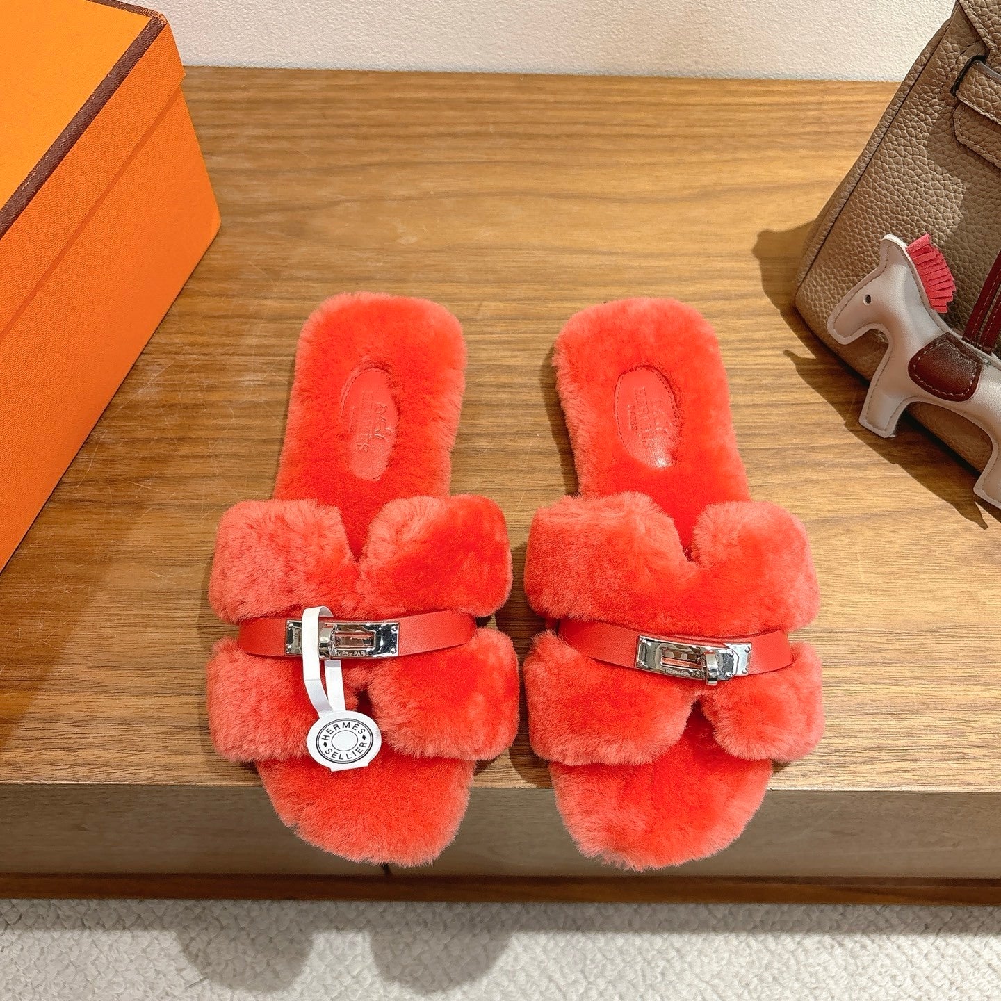CORAL FAUX FUR MULE SLIPPERS WITH SILVER-TONE ACCENT