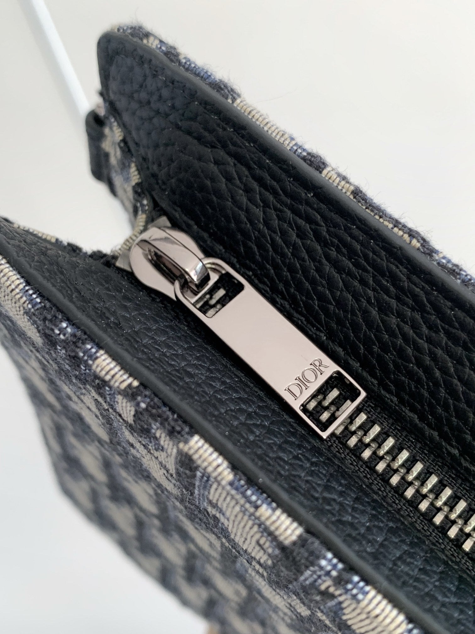 OBLIQUE CANVAS ZIP POUCH CLUTCH