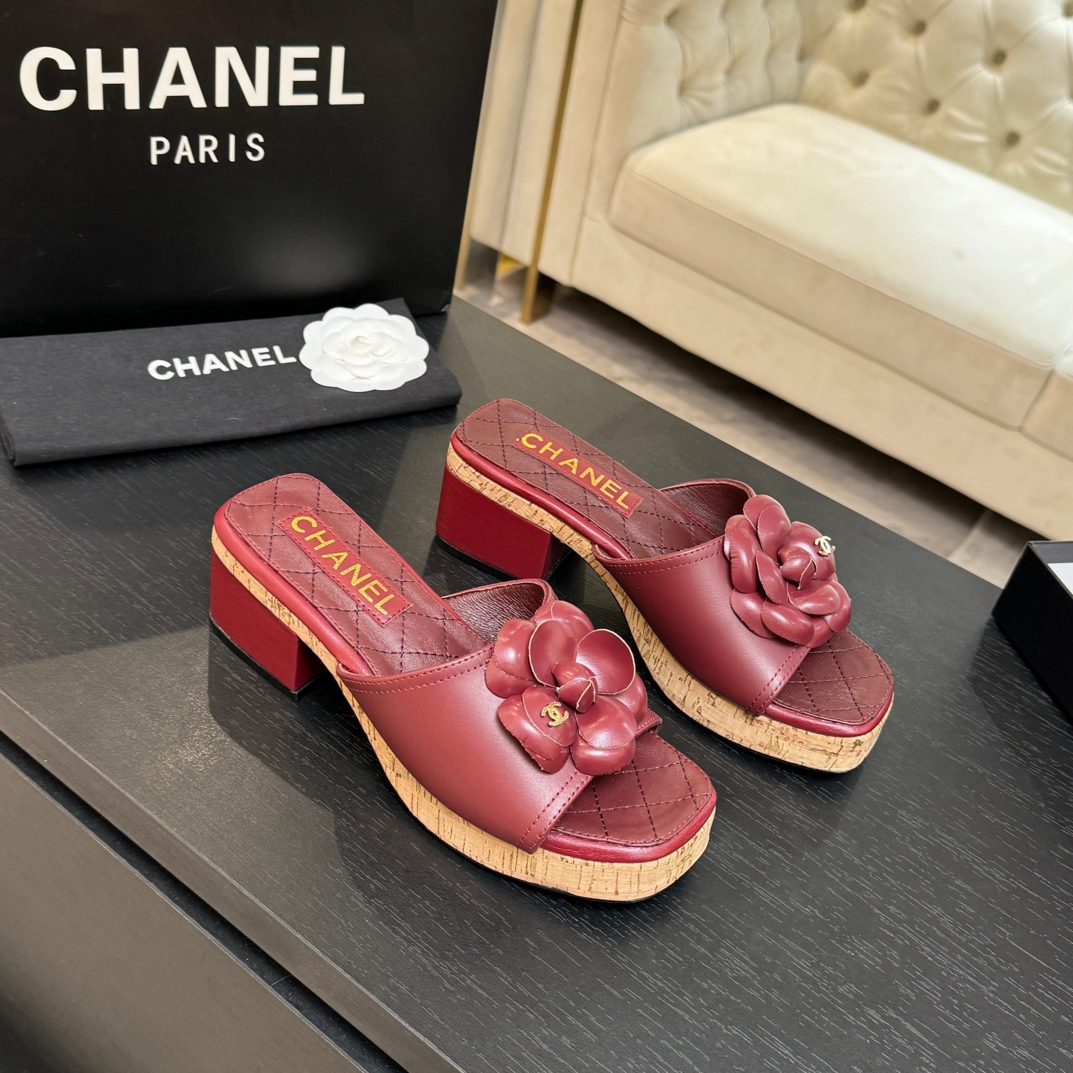 TERRACOTTA QUILTED PLATFORM SLIDE SANDALS WITH FLORAL DETAIL