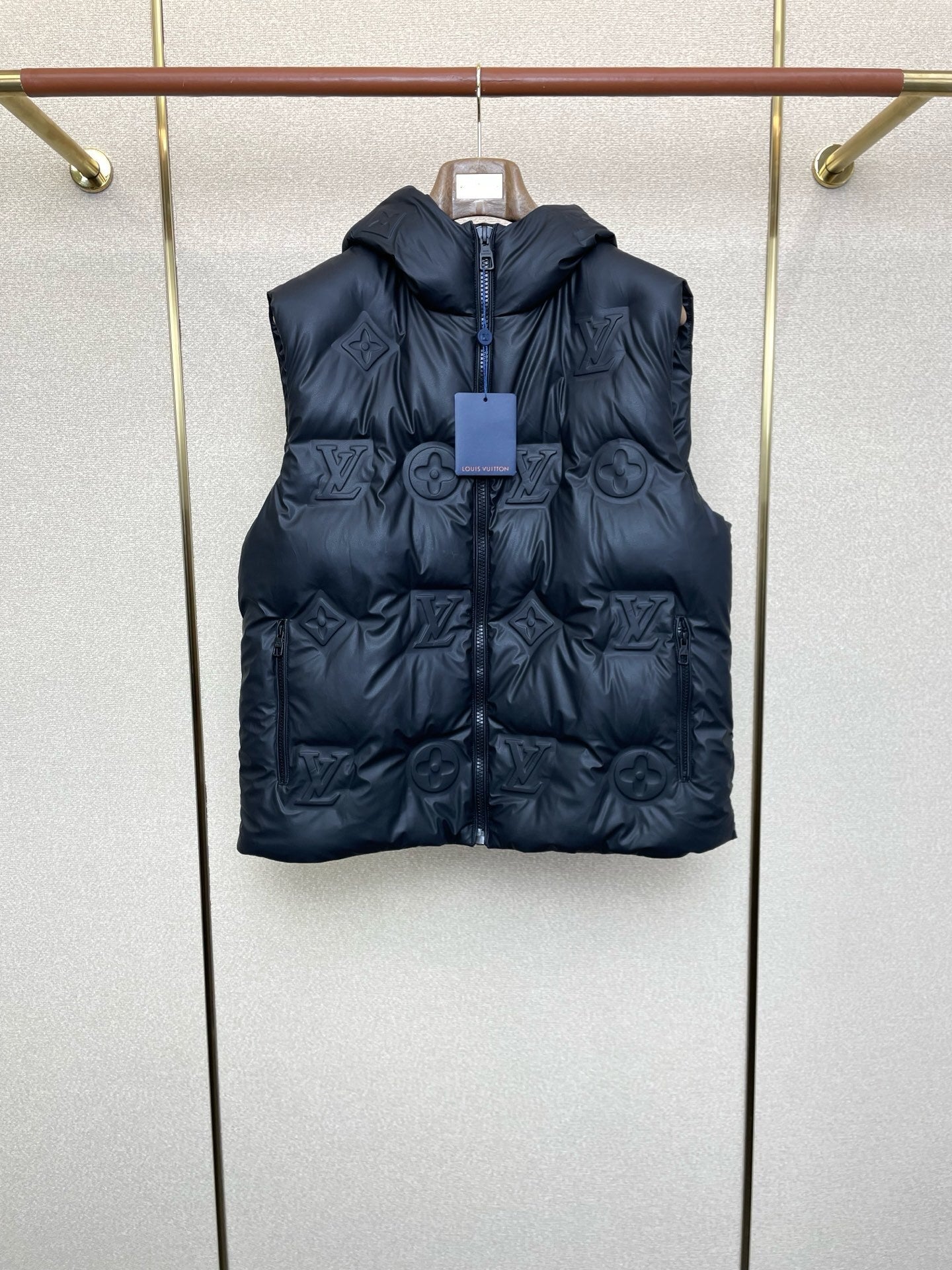EMBOSSED PADDED HOODED VEST