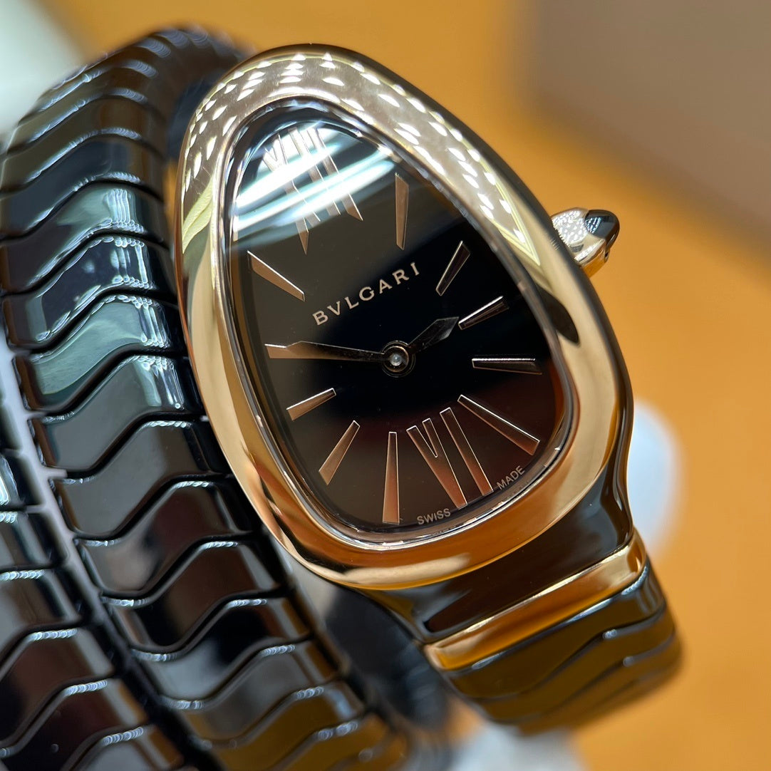 SERPENT WRAP WATCH – BLACK & GOLD ELEGANCE