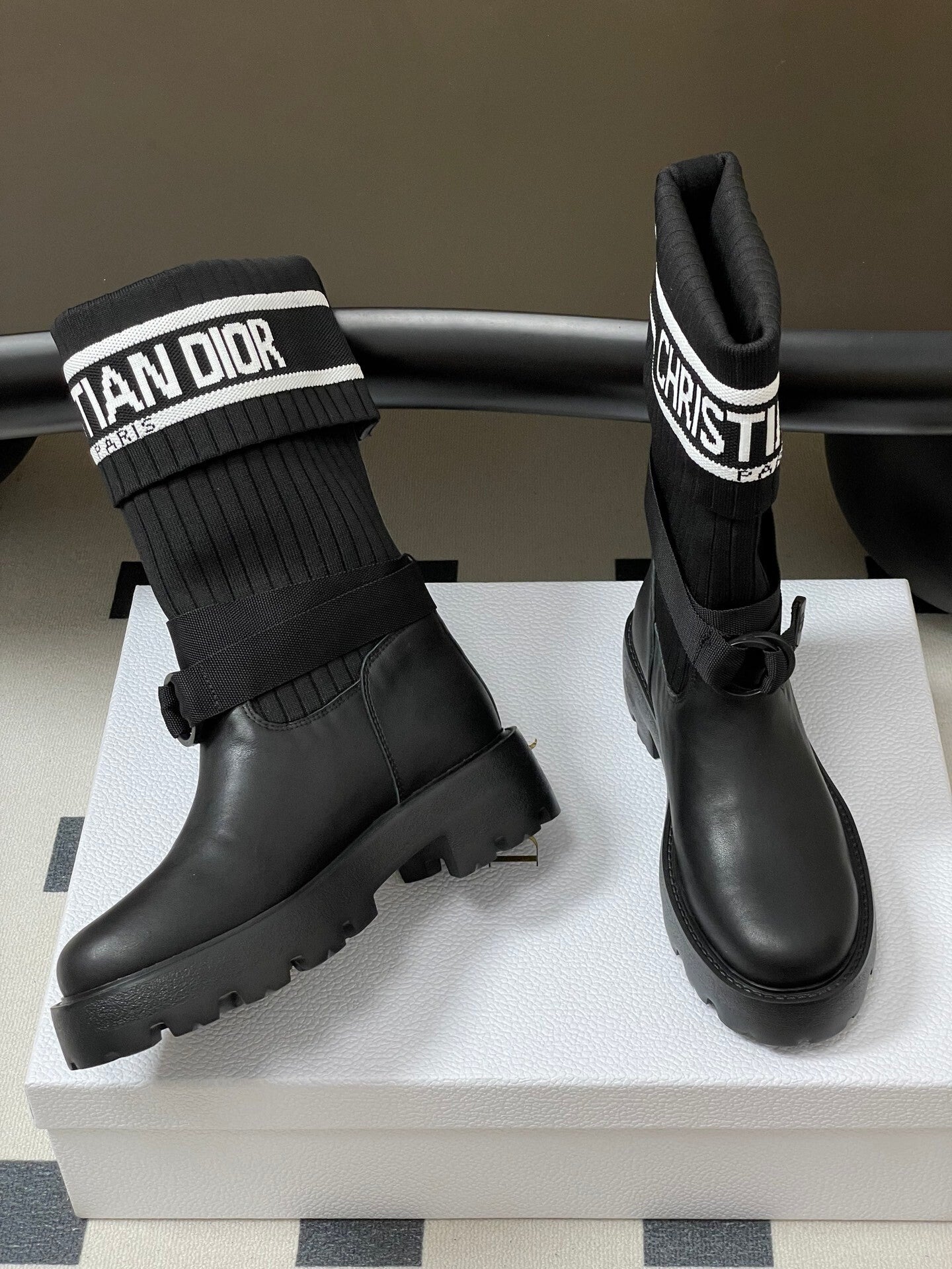 BLACK LEATHER MID-CALF BOOTS WITH RIBBED KNIT CUFF AND LUG SOLE