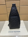 EMBOSSED LEATHER SLING BACKPACK