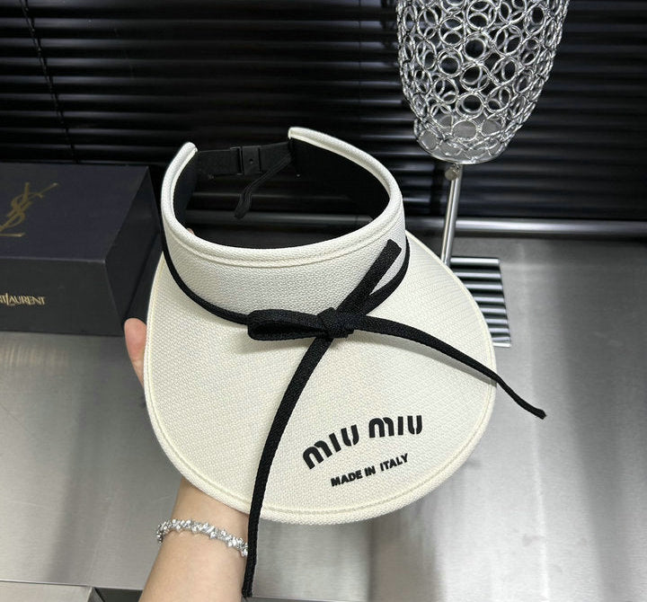 TEXTURED SUN VISOR WITH ADJUSTABLE TIE DETAIL