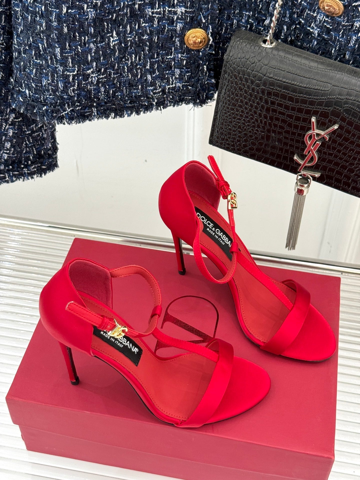 BOLD RED STRAPPY HEEL SANDALS WITH STATEMENT SILHOUETTE