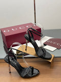BLACK PATENT STRAPPY HEEL SANDALS WITH METALLIC HEEL
