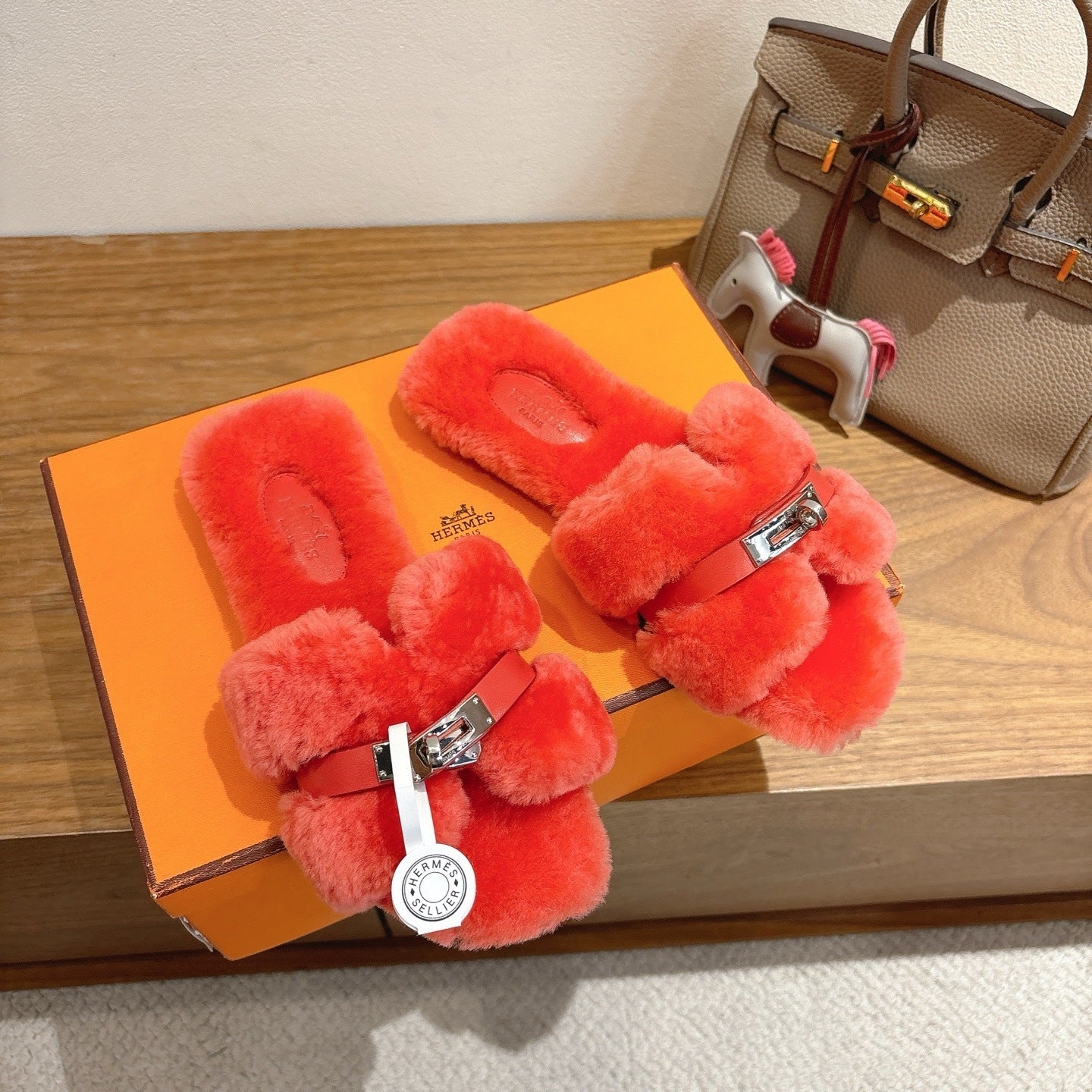 CORAL FAUX FUR MULE SLIPPERS WITH SILVER-TONE ACCENT
