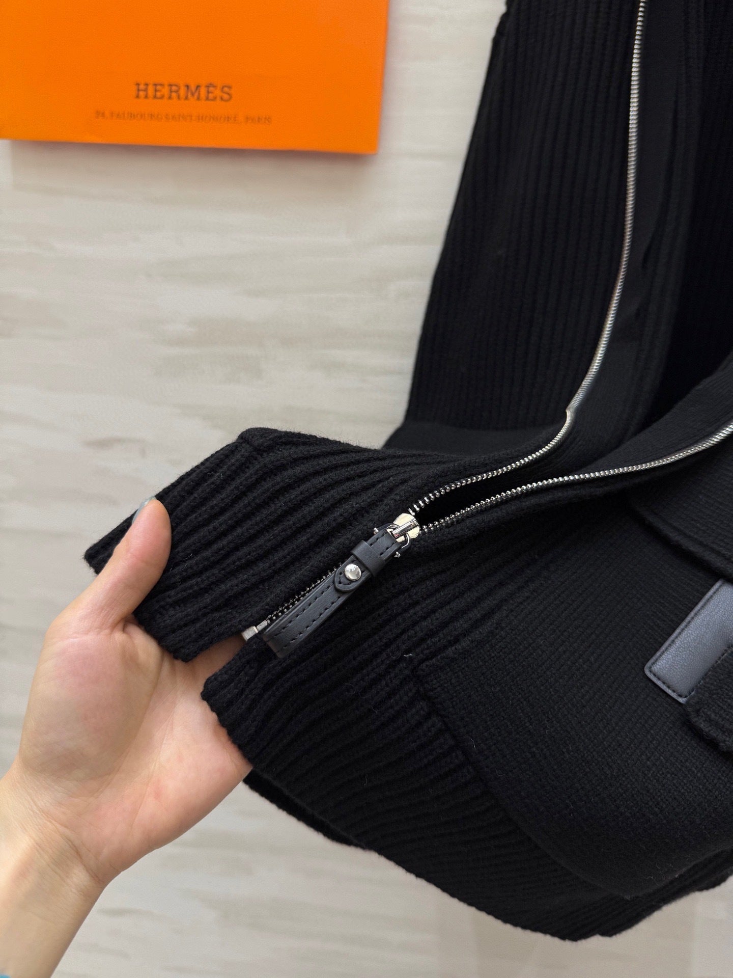 BLACK RIBBED ZIP-UP KNIT JACKET WITH UTILITY POCKETS