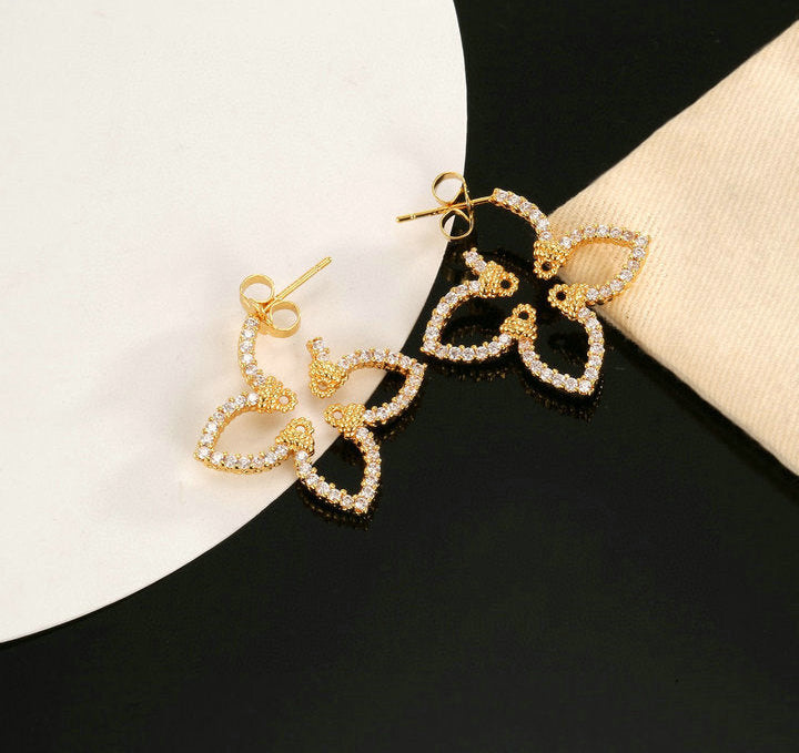 GOLD-TONE CRYSTAL FLOWER DROP EARRINGS