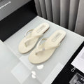 BEIGE FLIP FLOPS
