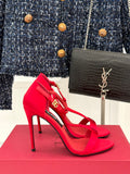 BOLD RED STRAPPY HEEL SANDALS WITH STATEMENT SILHOUETTE