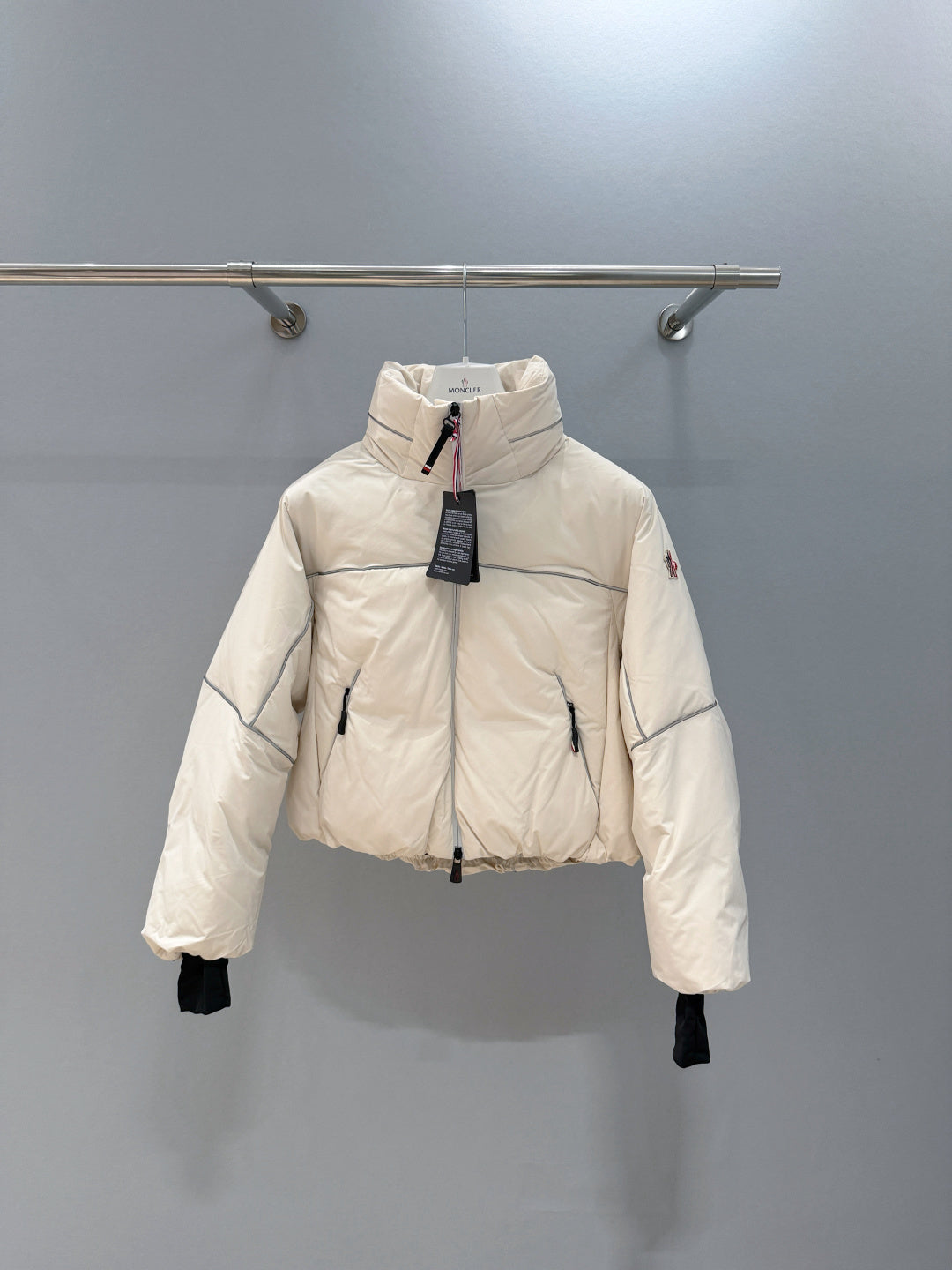CROPPED PADDED JACKET WITH HIGH COLLAR AND TECH DETAILS
