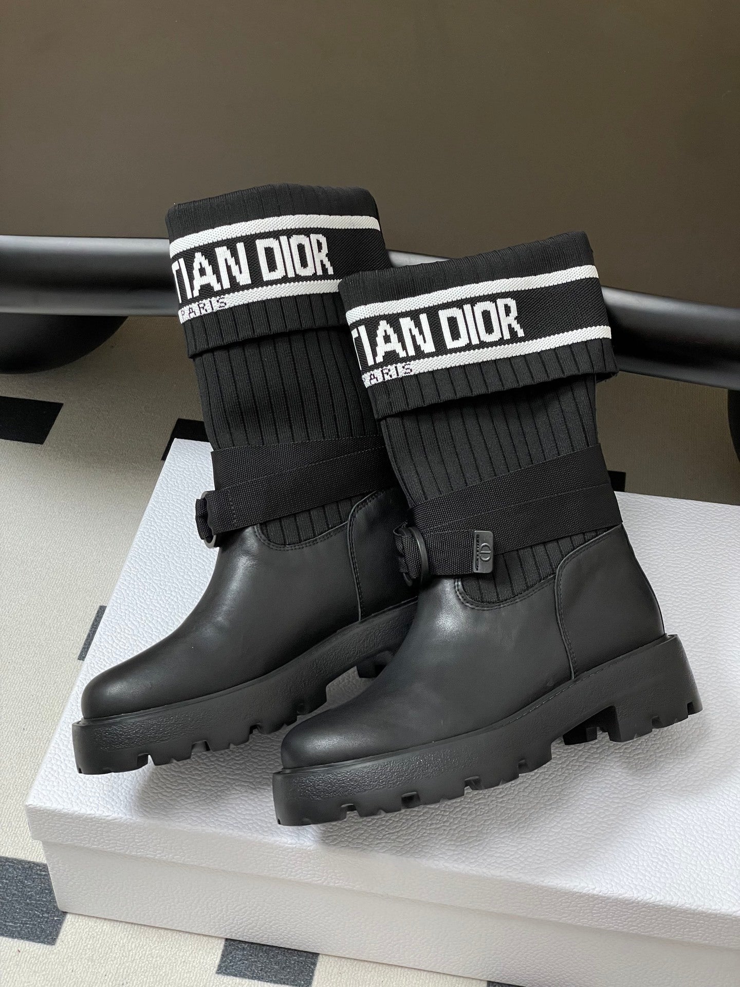 BLACK LEATHER MID-CALF BOOTS WITH RIBBED KNIT CUFF AND LUG SOLE