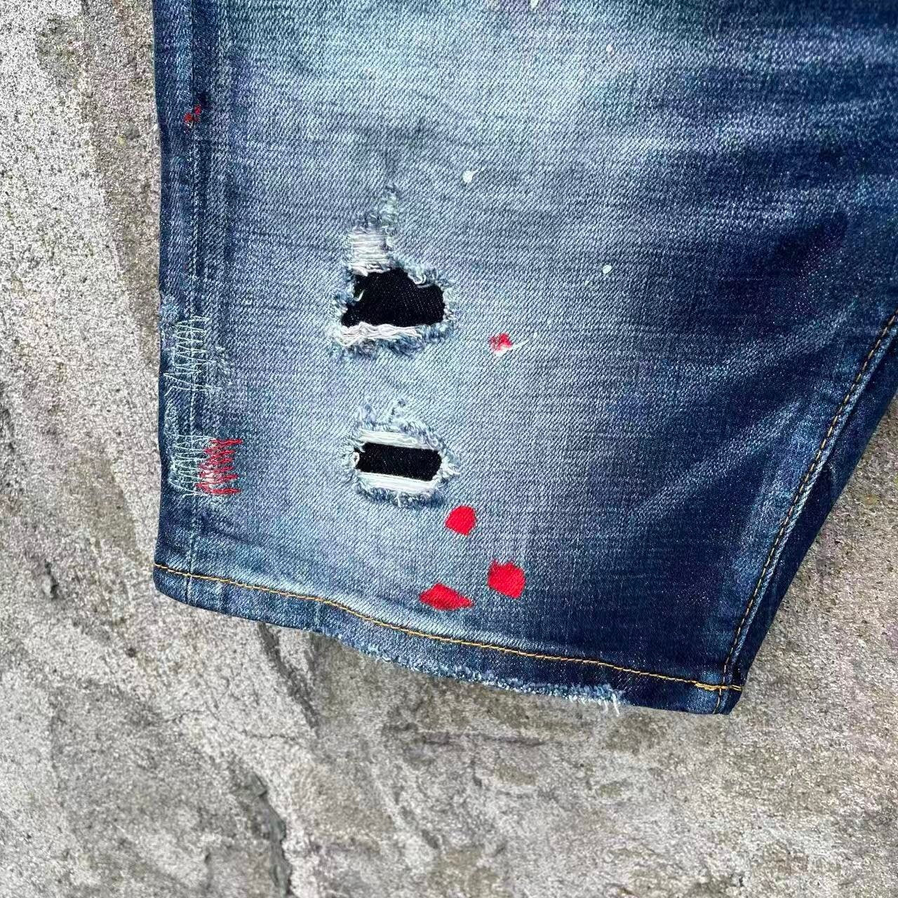 DISTRESSED PATCH DENIM SHORTS