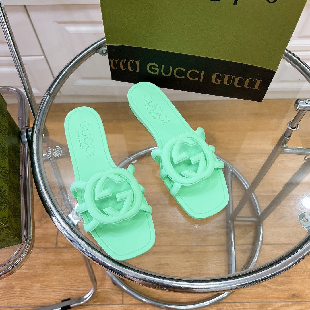 MINT GREEN RUBBER SLIDE SANDALS WITH ROUND EMBLEM