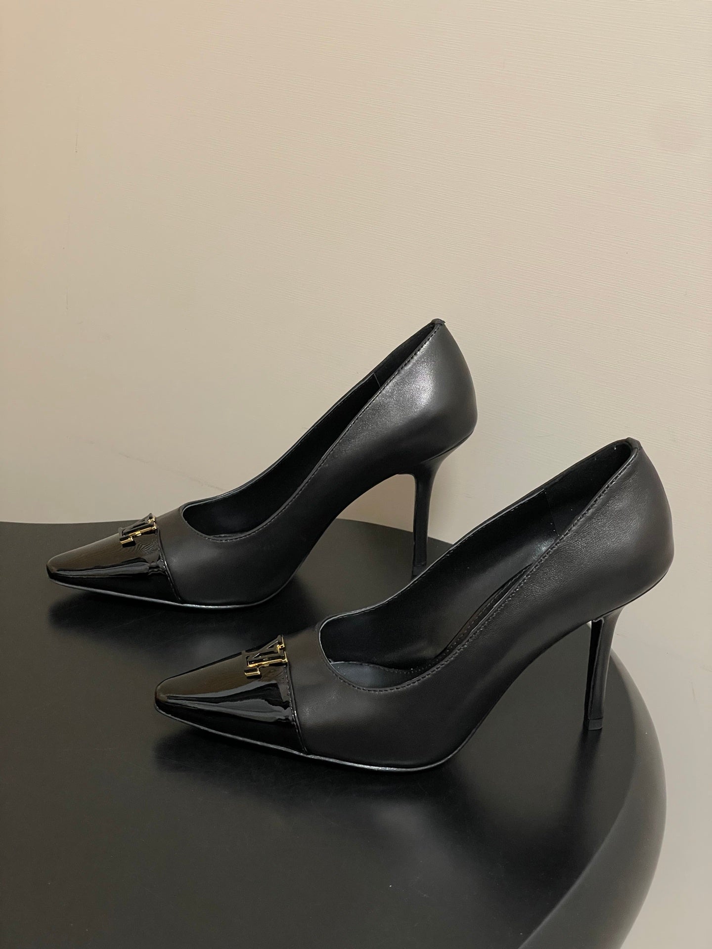 BLACK POINTED TOE LOGO STILETTO HEELS