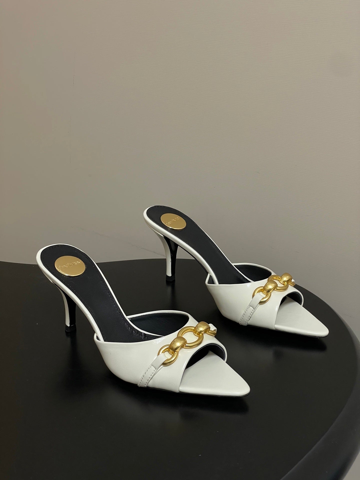 WHITE POINTED TOE MULE HEELS WITH GOLD DETAIL
