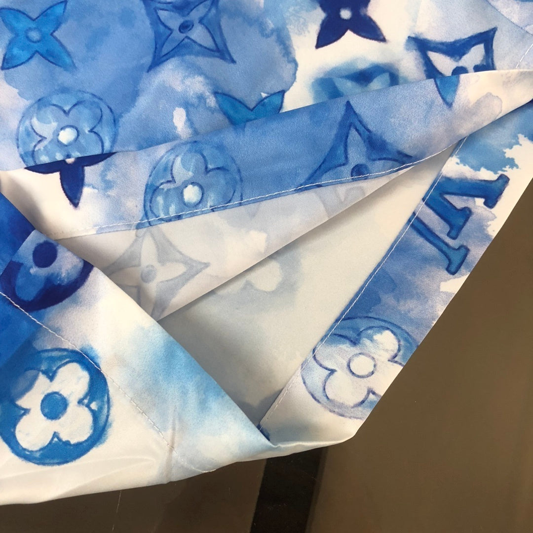 MONOGRAM SWIM SHORTS – BLUE TIE-DYE