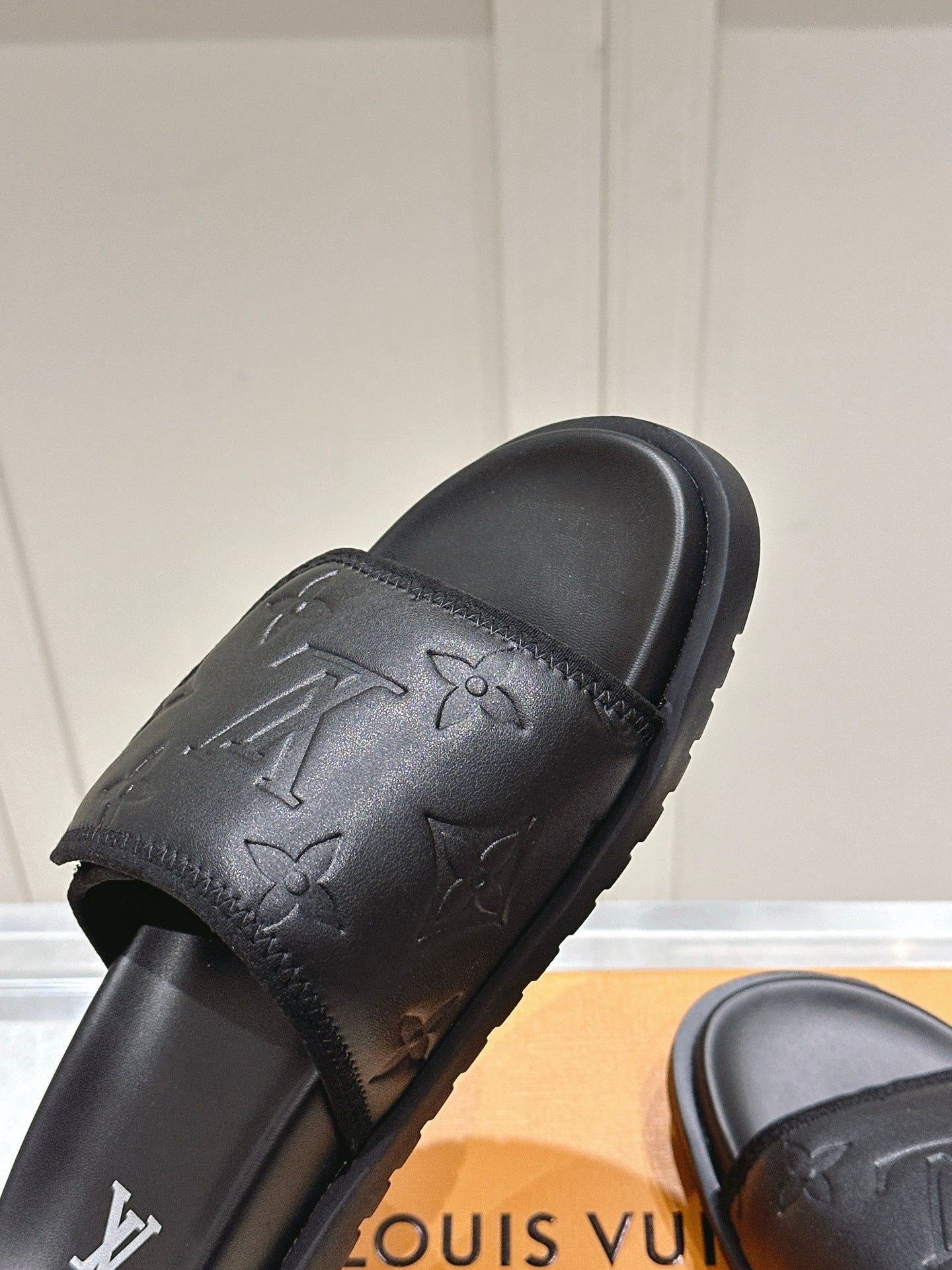 BLACK EMBOSSED SLIDE SANDALS