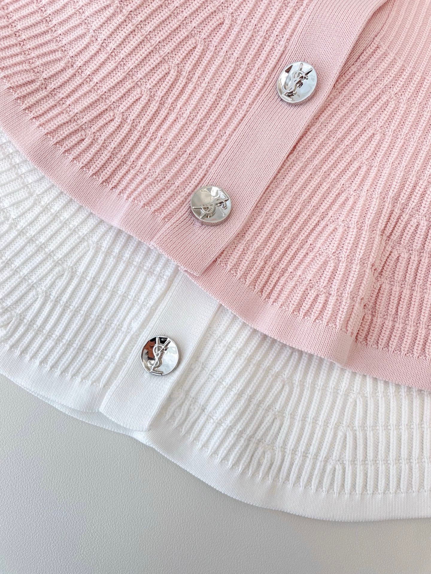 RIBBED PEPLUM KNIT TOP – BUTTON DETAIL