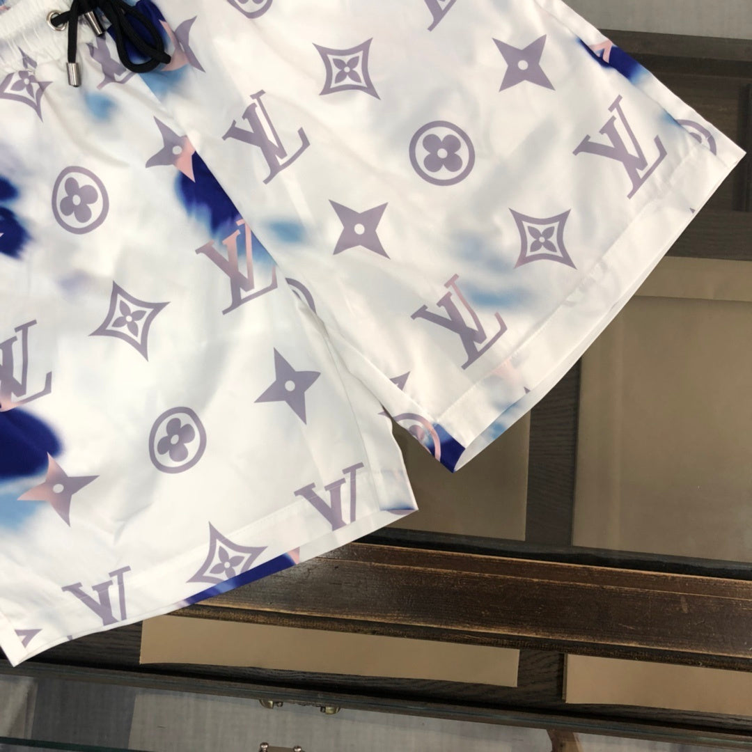 WHITE TIE-DYE PRINT SWIM SHORTS