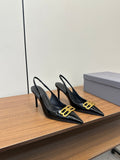 BLACK PATENT SLINGBACK POINTED HEELS